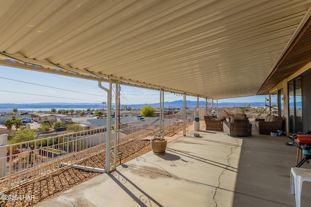 view of patio / terrace featuring a mountain view