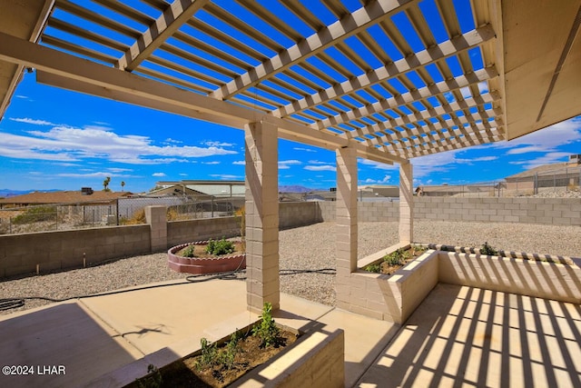 view of patio / terrace featuring a pergola