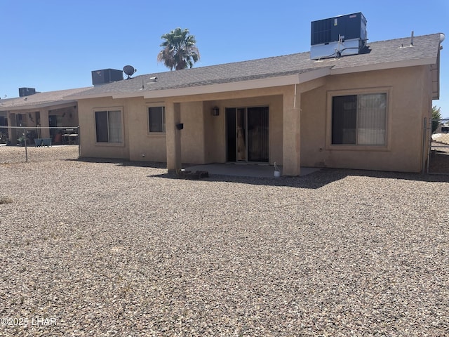 1990 Folzman Dr, Lake Havasu City, AZ 86404 - back of house with a patio area, stucco siding, and roof with shingles