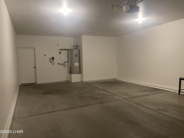 1990 Folzman Dr, Lake Havasu City, AZ 86404 - garage with electric water heater and a garage door opener