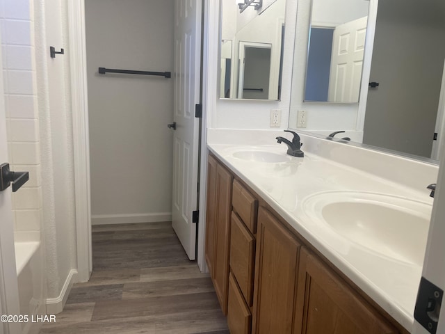 1990 Folzman Dr, Lake Havasu City, AZ 86404 - full bathroom with wood finished floors, double vanity, and shower / bathtub combination with curtain