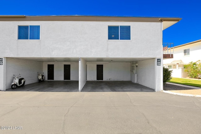 view of front of property with a carport