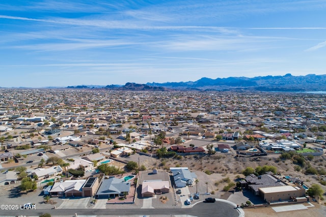 bird's eye view with a residential view and a mountain view