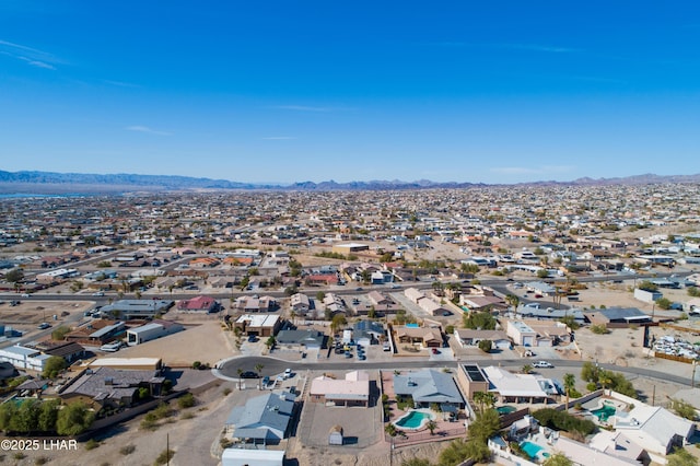 bird's eye view with a mountain view and a residential view