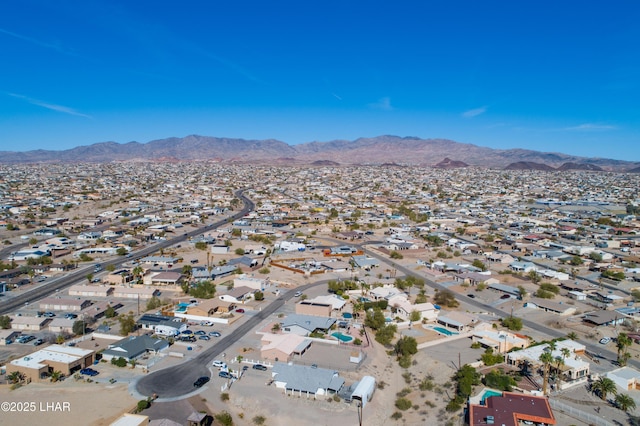 bird's eye view with a residential view and a mountain view