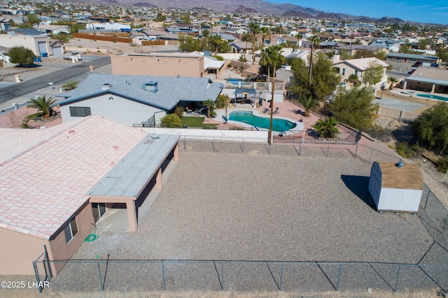 drone / aerial view with a residential view and a mountain view