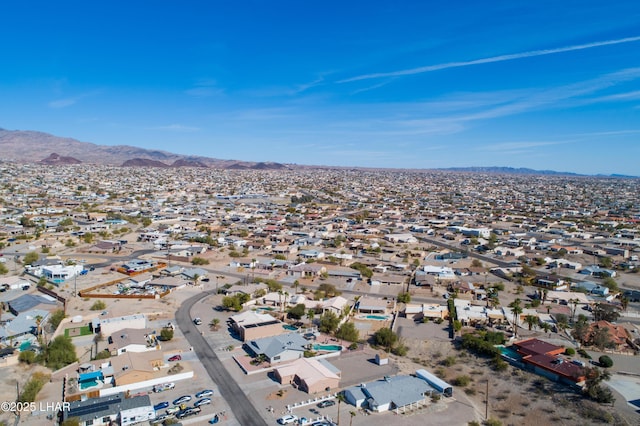 birds eye view of property with a residential view and a mountain view