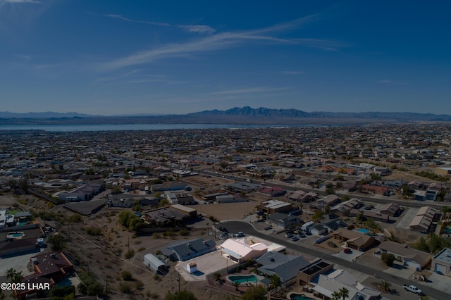 drone / aerial view with a residential view and a mountain view