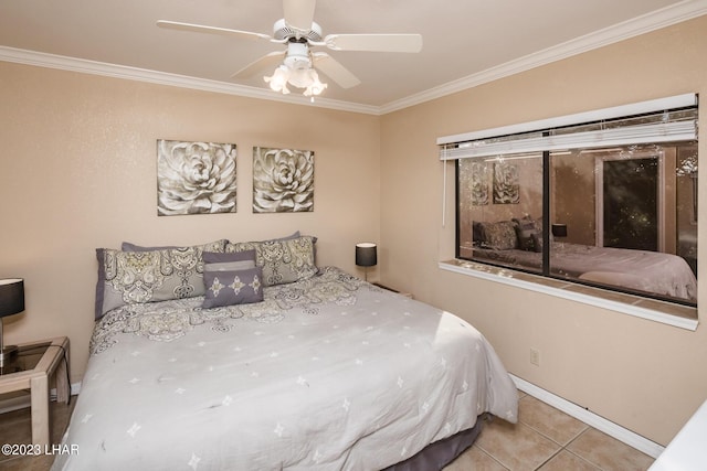 tiled bedroom with ceiling fan and ornamental molding