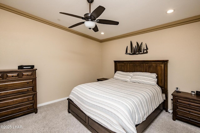 bedroom featuring light carpet, a ceiling fan, recessed lighting, crown molding, and baseboards