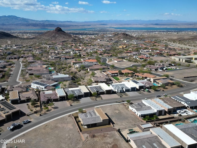 bird's eye view with a residential view and a mountain view