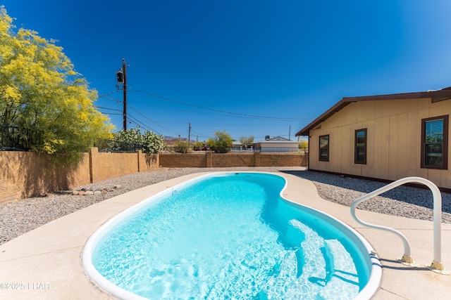 view of pool featuring a fenced backyard and a fenced in pool