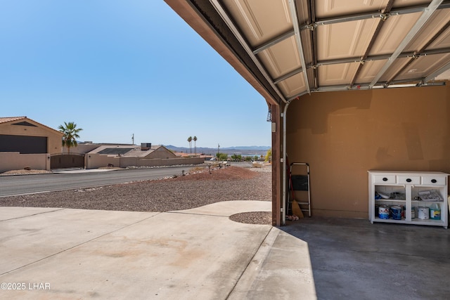 view of patio featuring a gate