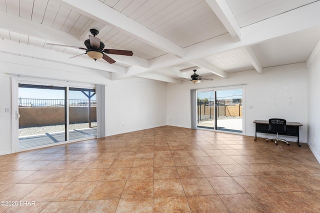 empty room with plenty of natural light, baseboards, and ceiling fan