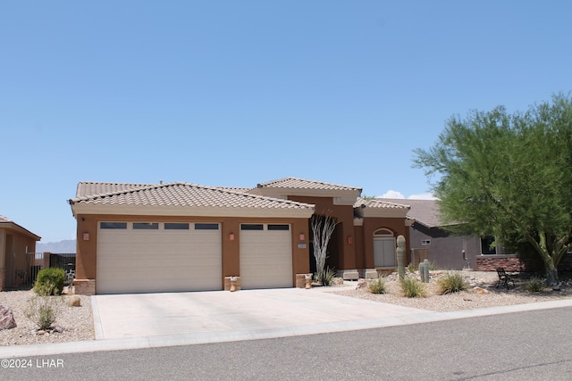 view of front of home with a garage