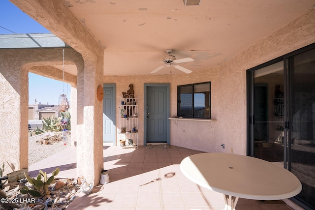 view of patio with ceiling fan