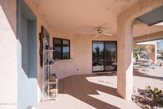 view of patio / terrace featuring a ceiling fan