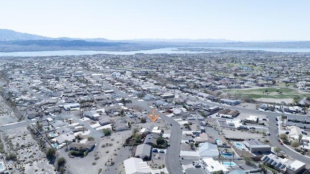 bird's eye view with a residential view and a water and mountain view