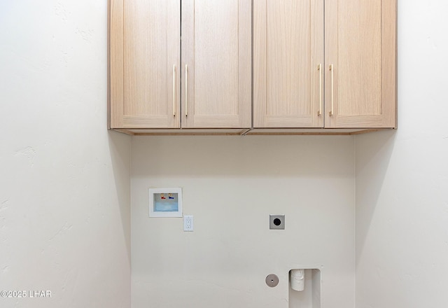 laundry room featuring cabinet space, hookup for a washing machine, and electric dryer hookup