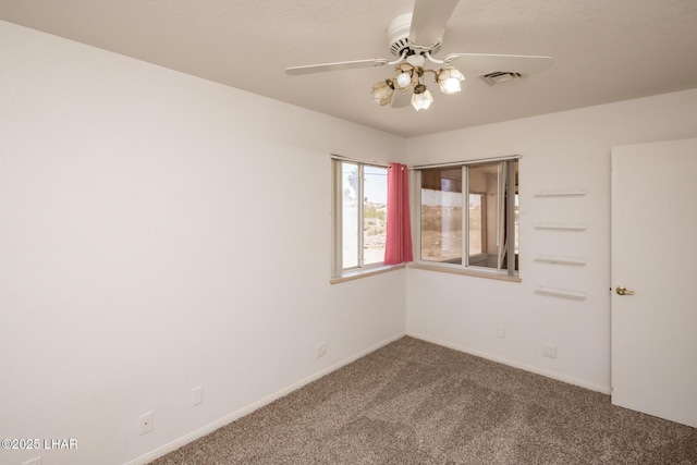 3716 Sloop Ln, Lake Havasu City, AZ 86406 - carpeted spare room featuring baseboards and a ceiling fan