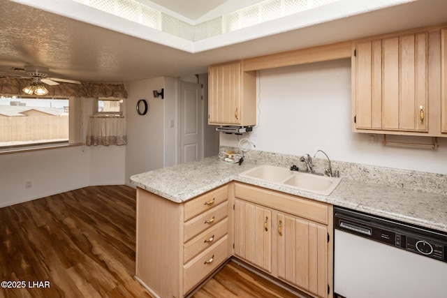 3716 Sloop Ln, Lake Havasu City, AZ 86406 - kitchen featuring white dishwasher, light brown cabinets, a sink, wood finished floors, and a peninsula