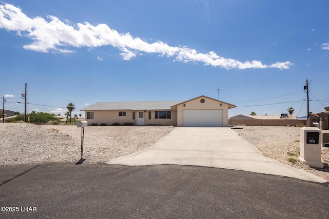 3716 Sloop Ln, Lake Havasu City, AZ 86406 - ranch-style home featuring an attached garage, driveway, and stucco siding