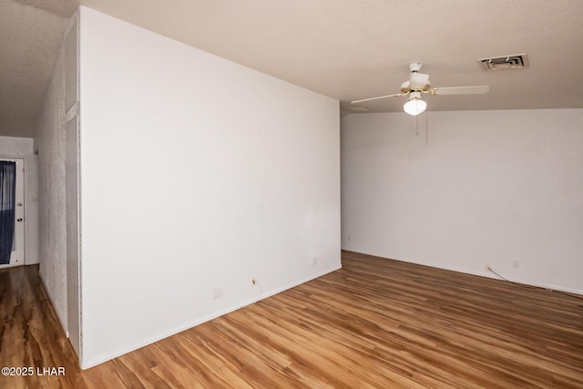 3716 Sloop Ln, Lake Havasu City, AZ 86406 - unfurnished room featuring wood finished floors and a ceiling fan