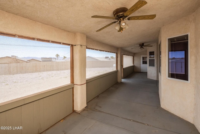 3716 Sloop Ln, Lake Havasu City, AZ 86406 - unfurnished sunroom with a textured ceiling and concrete floors