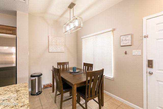 1650 Smoketree Ave S Unit 119, Lake Havasu City, AZ 86403 - dining room featuring light tile patterned floors and baseboards