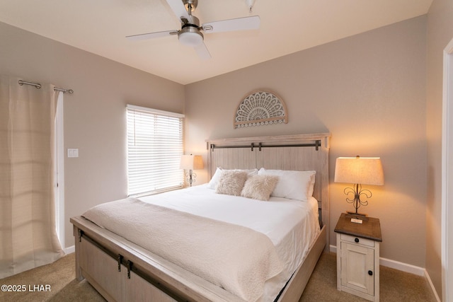 1650 Smoketree Ave S Unit 119, Lake Havasu City, AZ 86403 - bedroom with baseboards, ceiling fan, and light colored carpet