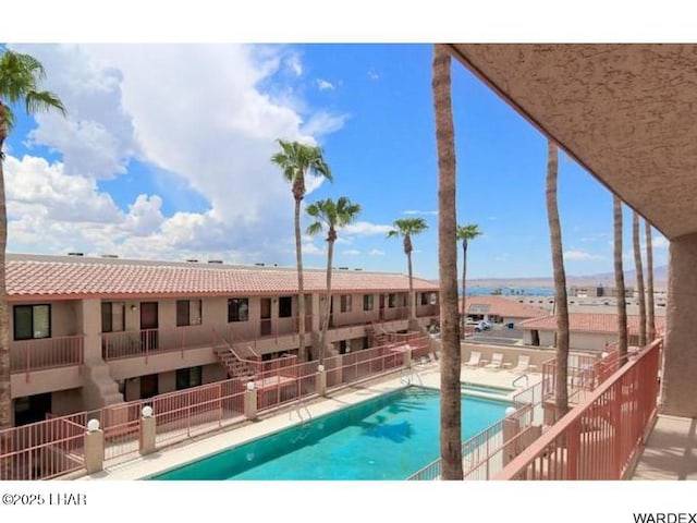 view of swimming pool featuring a patio