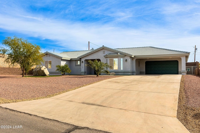 single story home featuring a garage