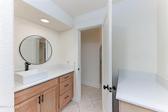 bathroom featuring vanity and tile patterned floors