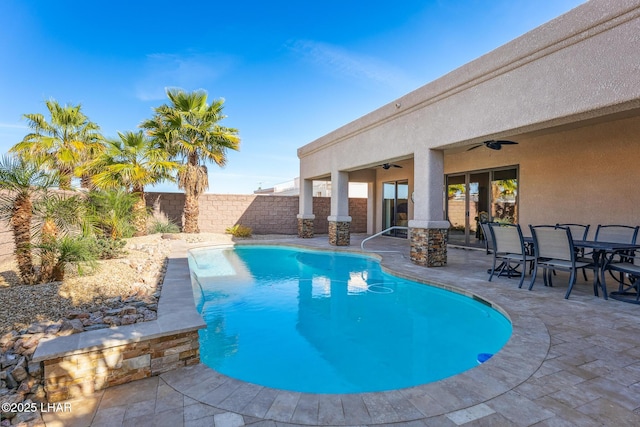 1589 Park Terrace Ave, Lake Havasu City, AZ 86404 - view of swimming pool with a fenced backyard, a ceiling fan, a fenced in pool, outdoor dining space, and a patio area