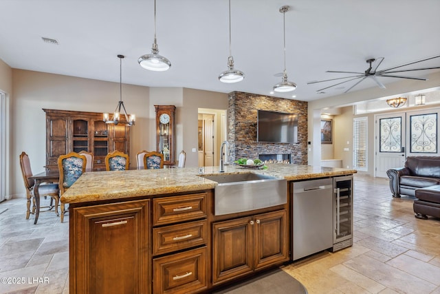 1589 Park Terrace Ave, Lake Havasu City, AZ 86404 - kitchen featuring visible vents, open floor plan, a sink, beverage cooler, and dishwasher