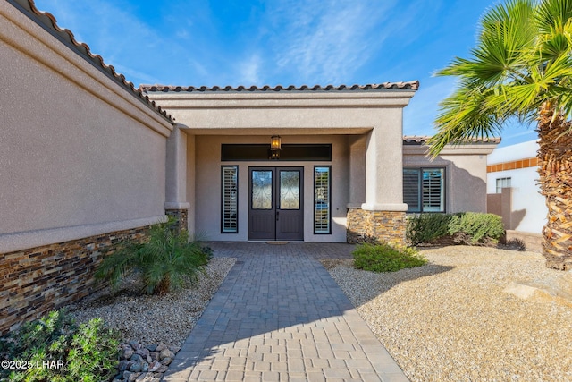 1589 Park Terrace Ave, Lake Havasu City, AZ 86404 - doorway to property with stone siding, covered porch, and stucco siding