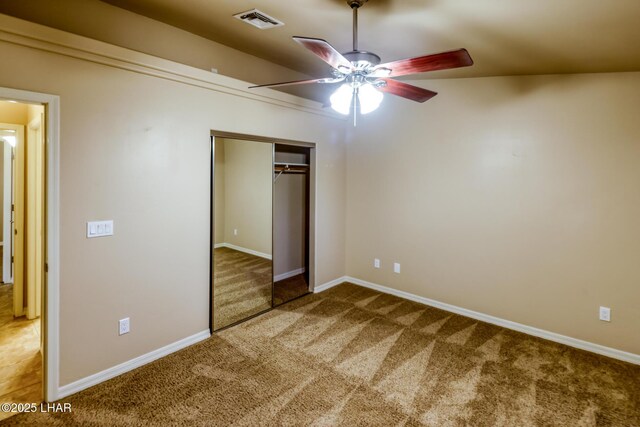 879 Window Rock Plz, Lake Havasu City, AZ 86406 - unfurnished bedroom with carpet floors, a closet, and ceiling fan