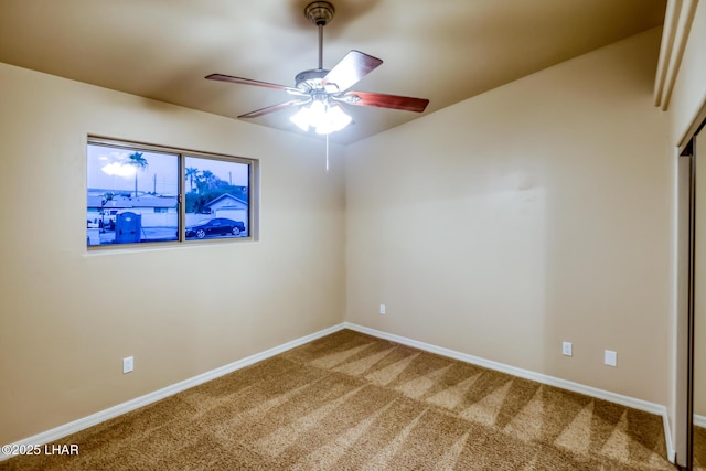 879 Window Rock Plz, Lake Havasu City, AZ 86406 - carpeted spare room with baseboards and ceiling fan