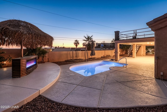 879 Window Rock Plz, Lake Havasu City, AZ 86406 - view of swimming pool featuring a fenced backyard, a patio, and stairway