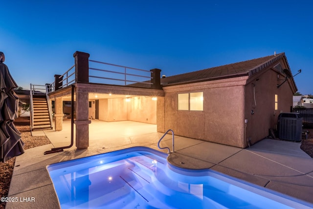 879 Window Rock Plz, Lake Havasu City, AZ 86406 - back of property featuring stairway, a patio, and stucco siding