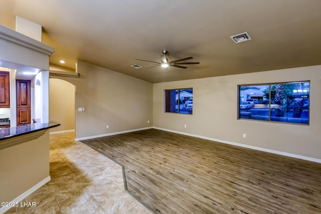 879 Window Rock Plz, Lake Havasu City, AZ 86406 - unfurnished living room featuring ceiling fan and wood finished floors