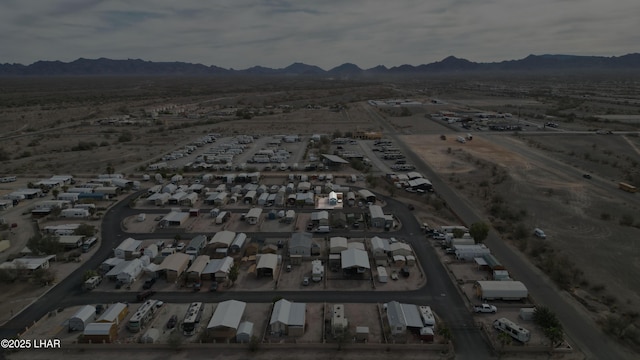 drone / aerial view featuring a mountain view