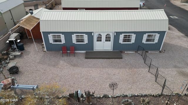 view of front facade with metal roof