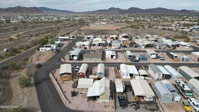 birds eye view of property with a residential view and a mountain view