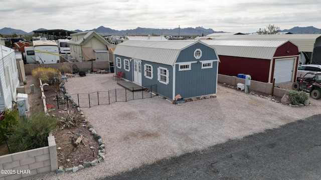 exterior space featuring a mountain view