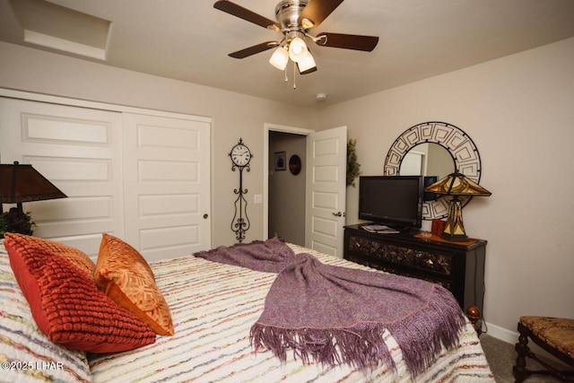 2870 Havasupai Blvd, Lake Havasu City, AZ 86404 - bedroom featuring carpet, a closet, baseboards, and a ceiling fan