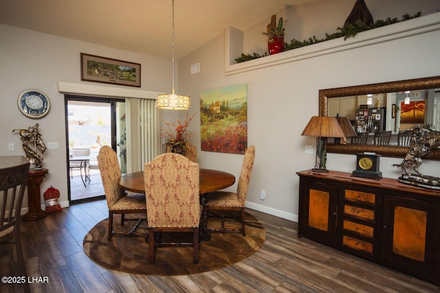 2870 Havasupai Blvd, Lake Havasu City, AZ 86404 - dining space with high vaulted ceiling, dark wood-style flooring, and baseboards