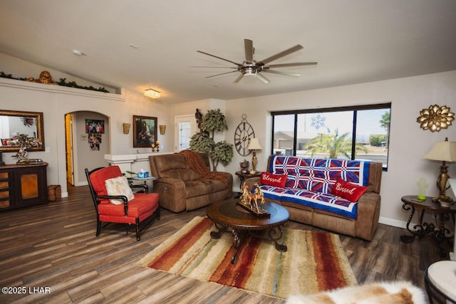 2870 Havasupai Blvd, Lake Havasu City, AZ 86404 - living area featuring arched walkways, wood finished floors, ceiling fan, baseboards, and vaulted ceiling