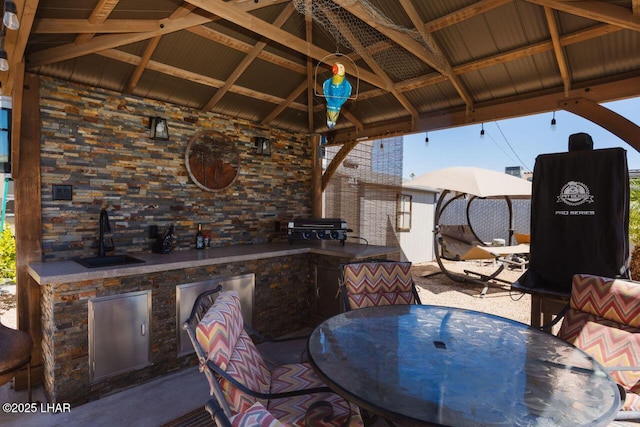 2870 Havasupai Blvd, Lake Havasu City, AZ 86404 - view of patio featuring a gazebo, a sink, an outdoor kitchen, and outdoor dining space