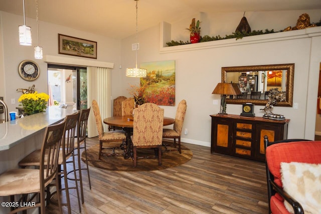 2870 Havasupai Blvd, Lake Havasu City, AZ 86404 - dining space featuring wood finished floors, lofted ceiling, and baseboards